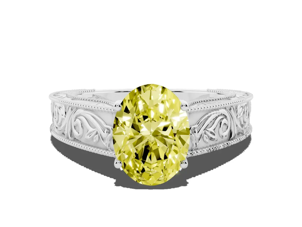 Fancy Yellow Oval Cut Diamond Solitaire Ring with Engraved Band and Four-Prong Setting Silver