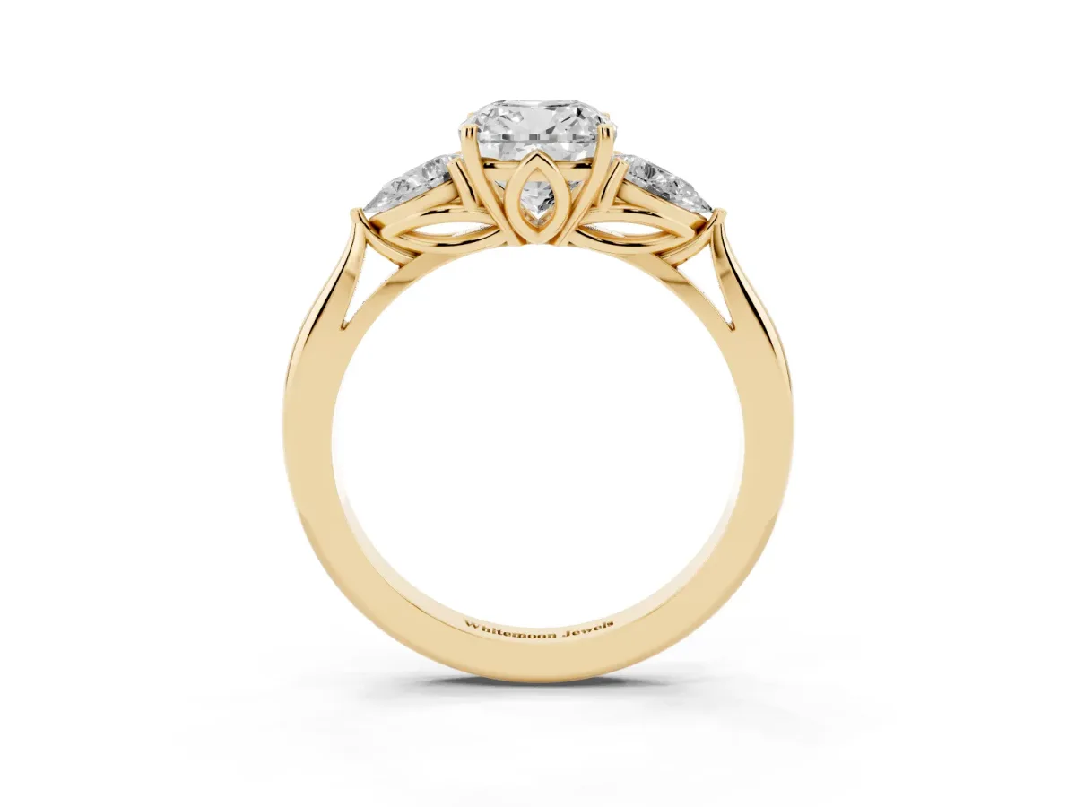 Cushion Cut Diamond Three-Stone Ring with Pear Side Stones and Prong Setting Yellow gold