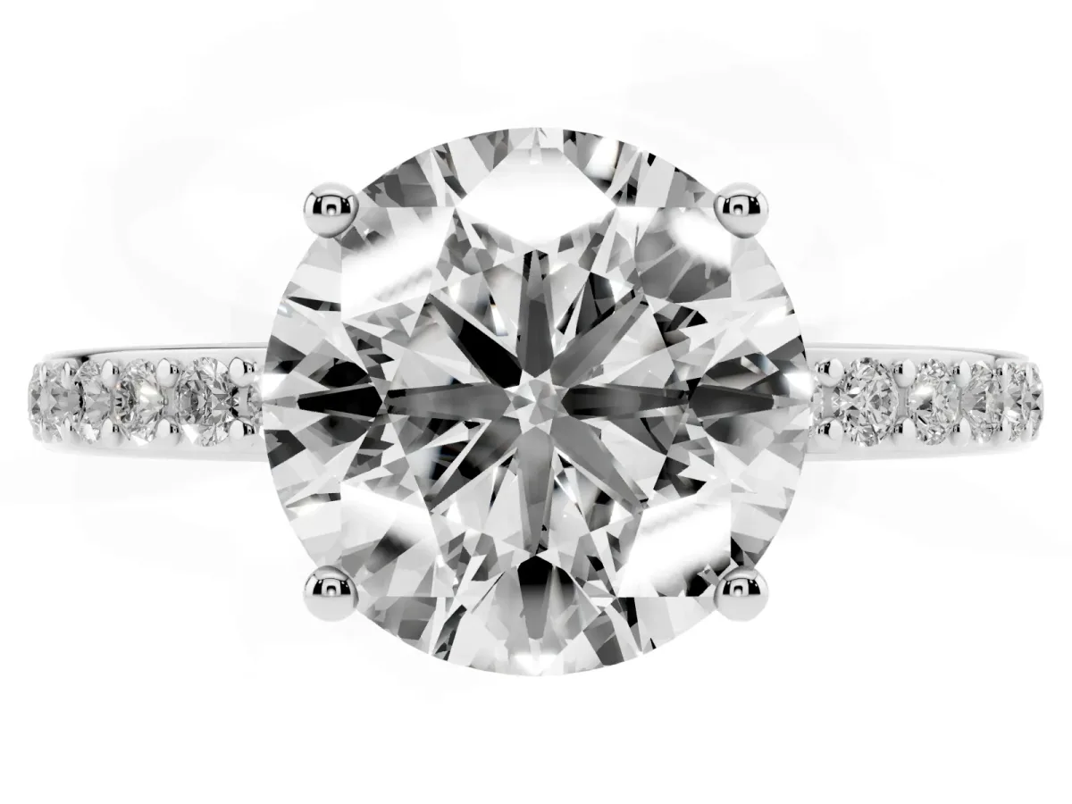 Round Cut Cut Diamond Pavé Band Ring with Four-Prong Setting Silver