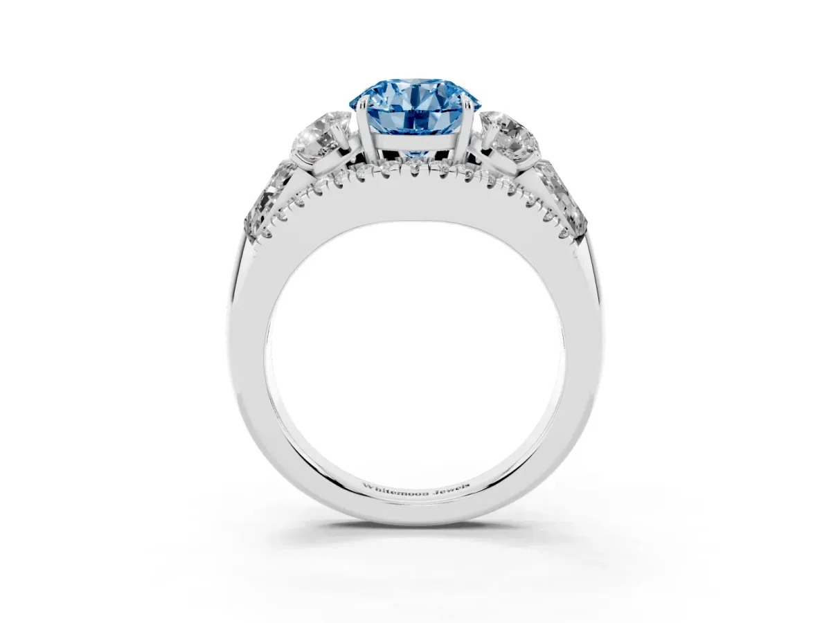 Fancy Blue Three-Stone Round Cut Diamond Engagement Ring with Pave Band and Prong Setting Silver