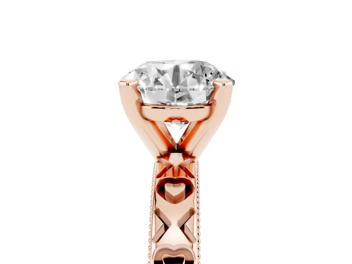 Round Cut Solitaire Diamond Engagement Ring with XO Engraved Band and Four-Prong Setting Rose gold