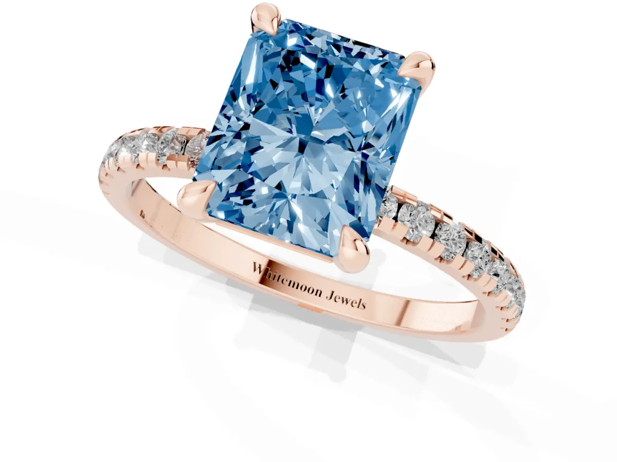 Fancy Blue Radiant Cut Diamond Brilliant Solitaire Ring with Pavé Band and Four-Prong Setting Rose gold