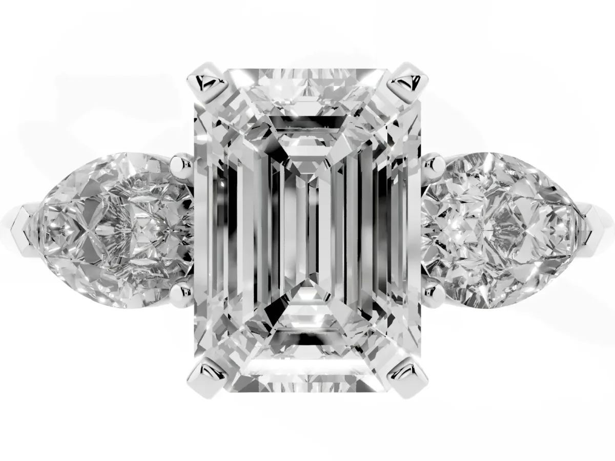 Three-Stone Emerald Cut Diamond Ring with Pear Side Stones and Four-Prong Setting Platinum