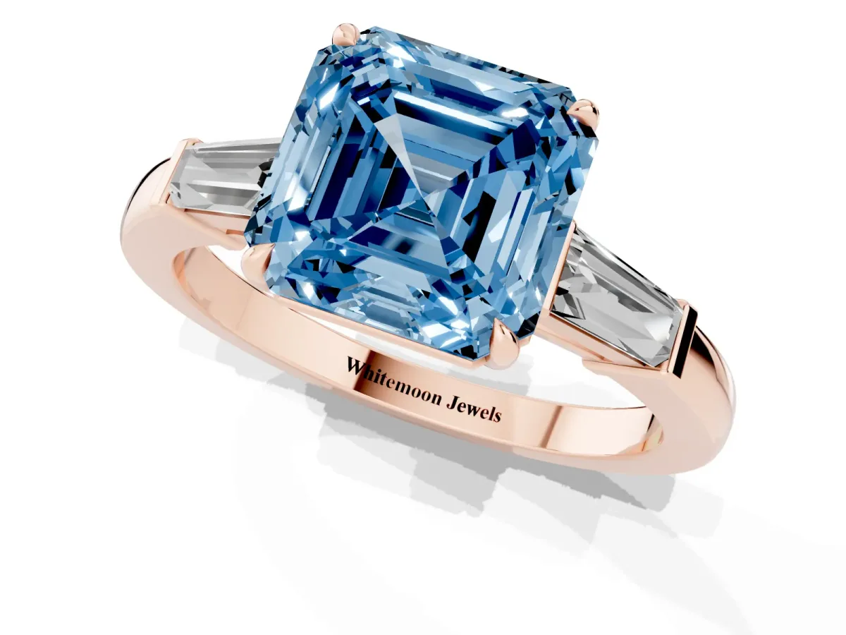 Fancy Blue Asscher Cut Diamond Three-Stone Ring with Tapered Baguette Side Stones and Prong Setting Rose gold