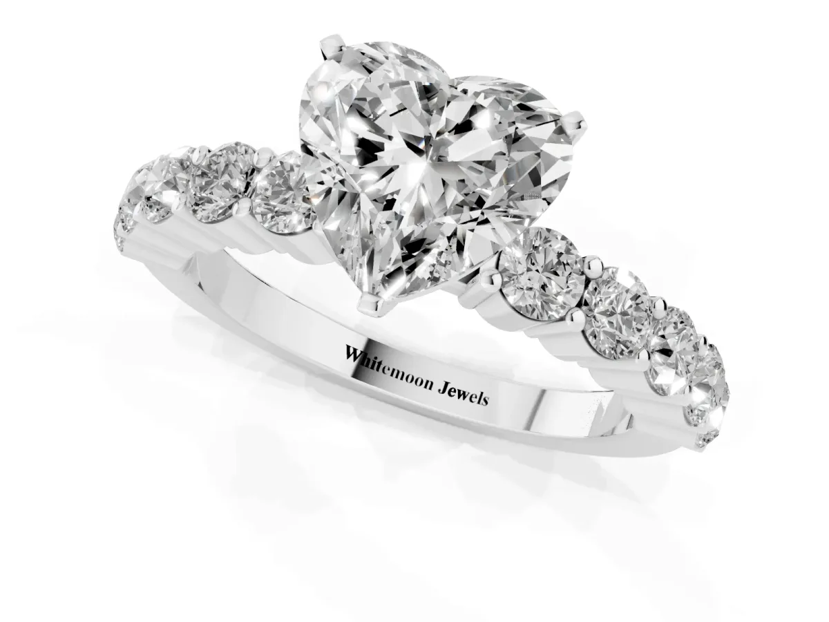 Heart Cut Diamond Solitaire Ring with Shared Prong Round Side Stones Silver