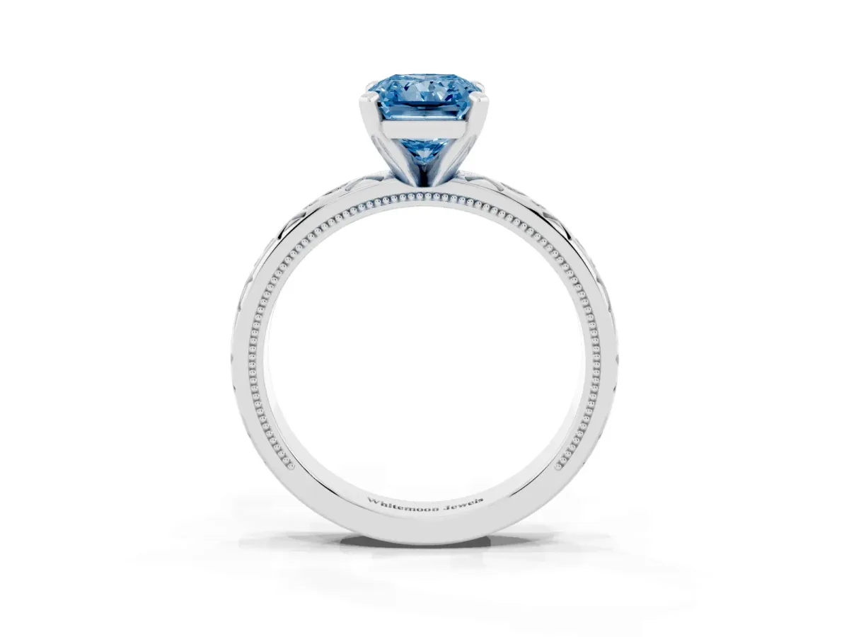 Fancy Blue Radiant Cut Solitaire Engagement Ring with Scrollwork Band and Four-Prong Setting Silver