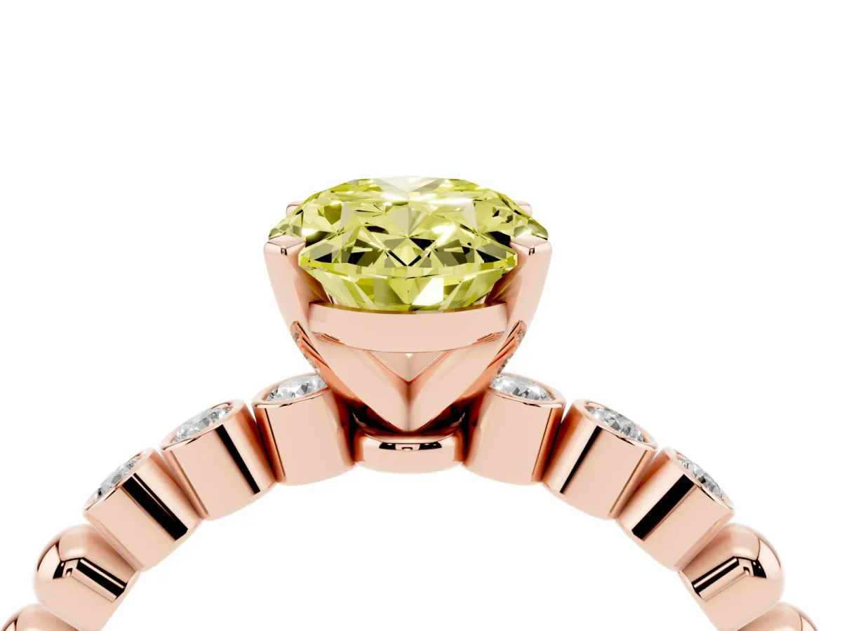 Fancy Yellow Oval Cut Solitaire Bezel Accent Diamond Engagement Ring with Beaded Band and Four-Prong Setting Rose gold