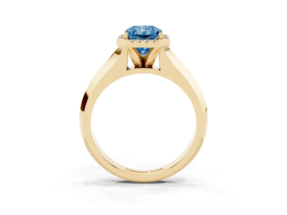 Fancy Blue Radiant Cut Halo Diamond Ring with Cathedral Band and Four-Prong Setting Yellow gold
