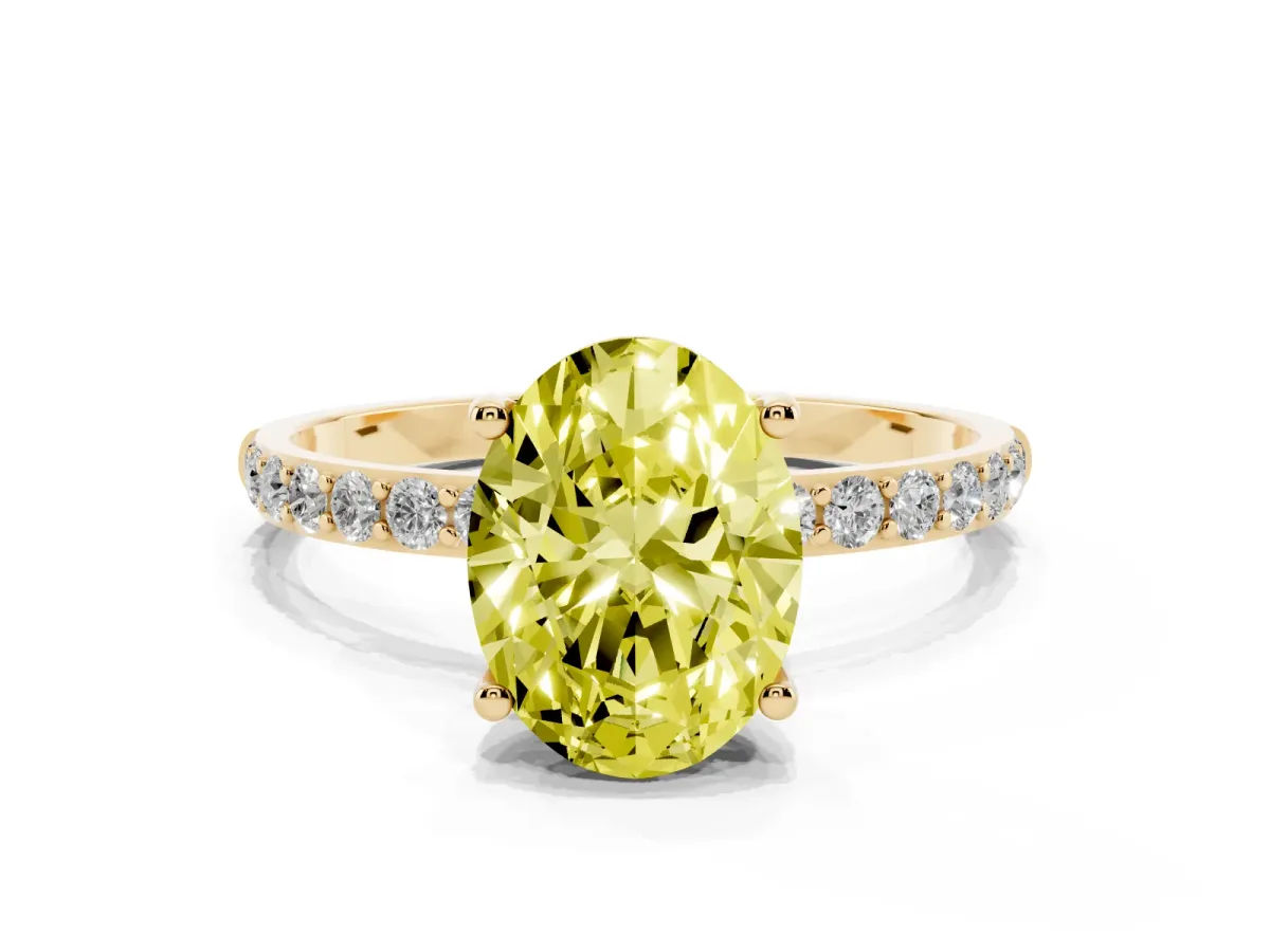 Fancy Yellow Oval Cut Diamond Solitaire Ring with Round Pavé Shoulders and Prong Setting Yellow gold