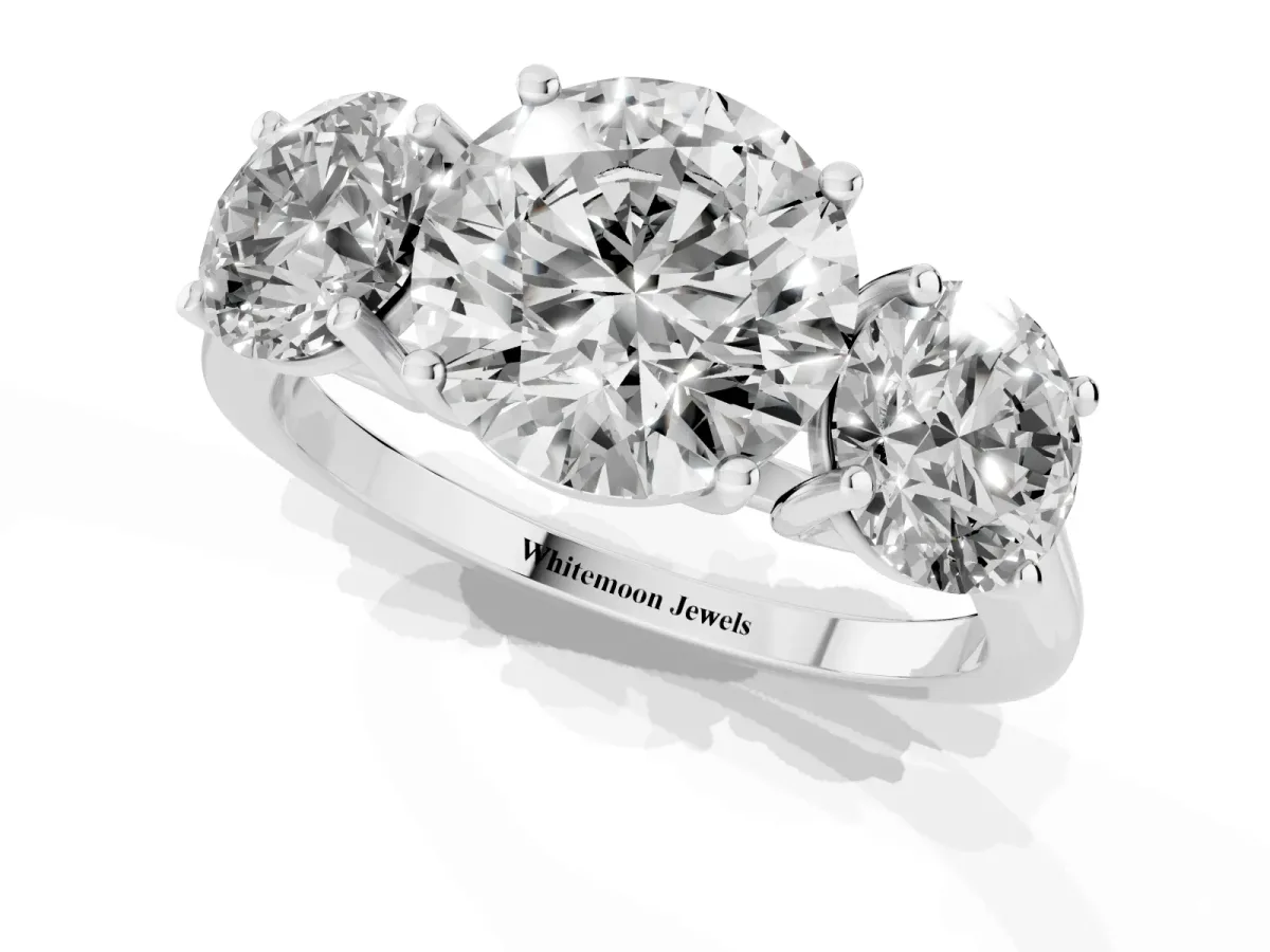 Three-Stone Round Cut Cut Solitaire Ring with Classic Band and Prong Setting Platinum
