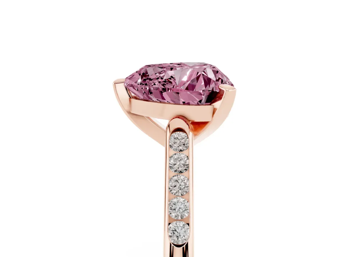 Fancy Pink Heart Cut Diamond Solitaire Ring with Channel Set Round Band and Prong Setting Rose gold