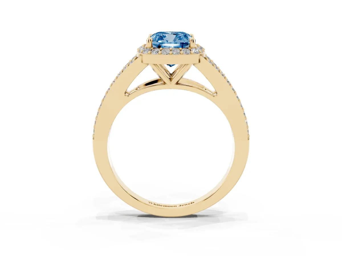 Fancy Blue Cushion Cut Halo Split Shank Pave Diamond Ring with Four-Prong Setting Yellow gold