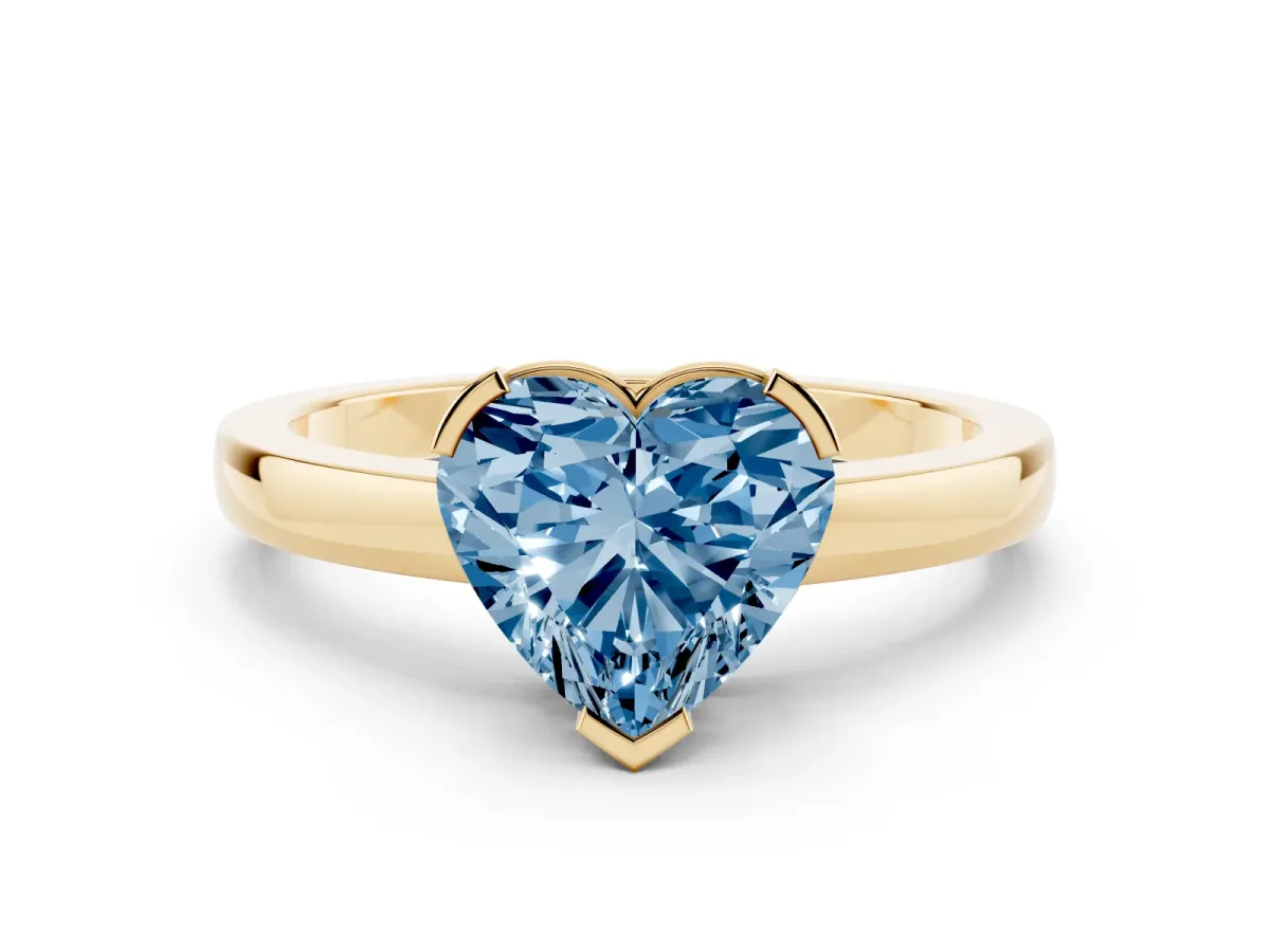 Fancy Blue Heart Cut Cut Solitaire Ring with Four-Prong Setting and Classic Band Yellow gold