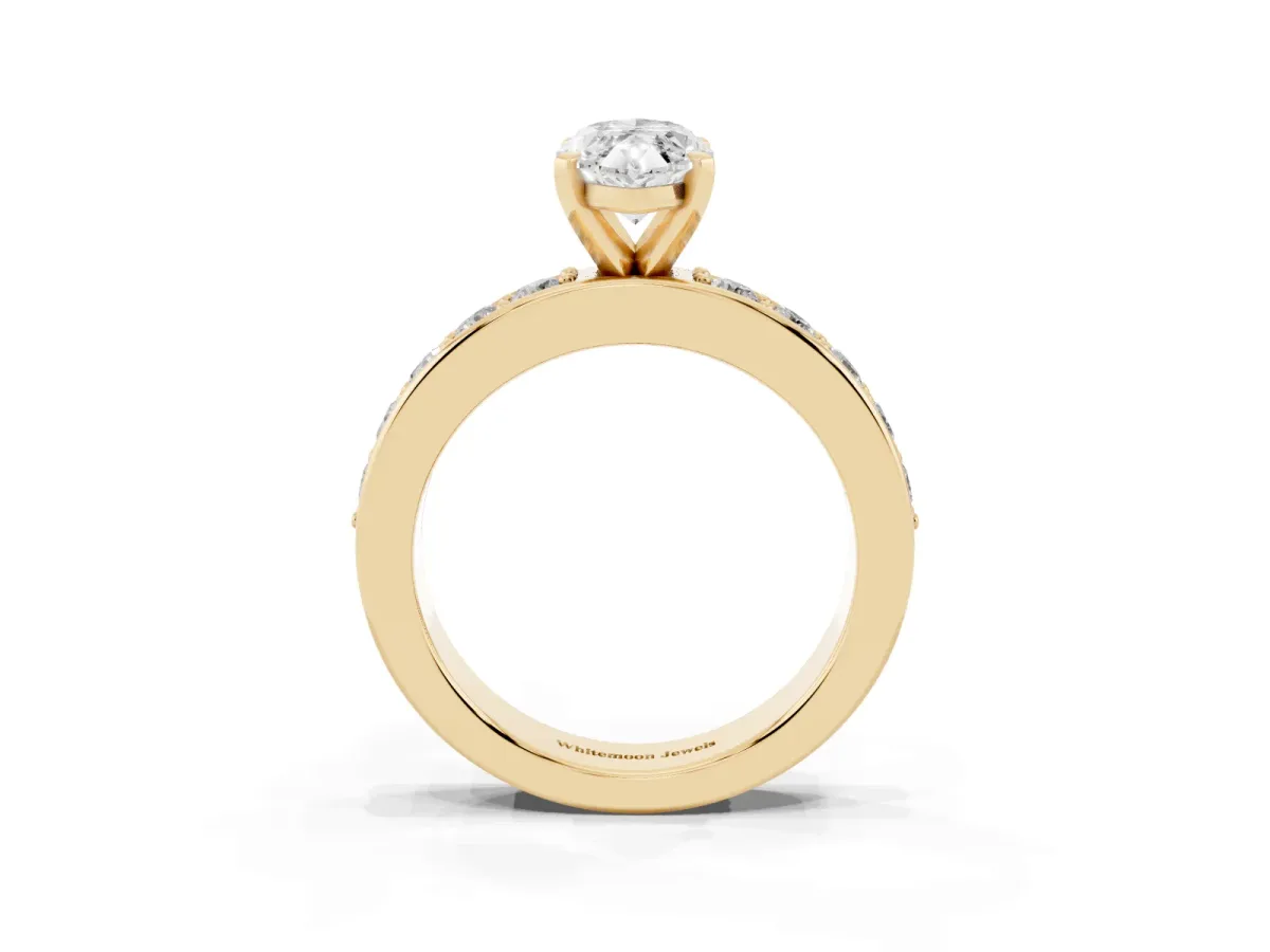 Marquise Cut Diamond Engagement Ring with Channel Set Round Band and Prong Setting Yellow gold