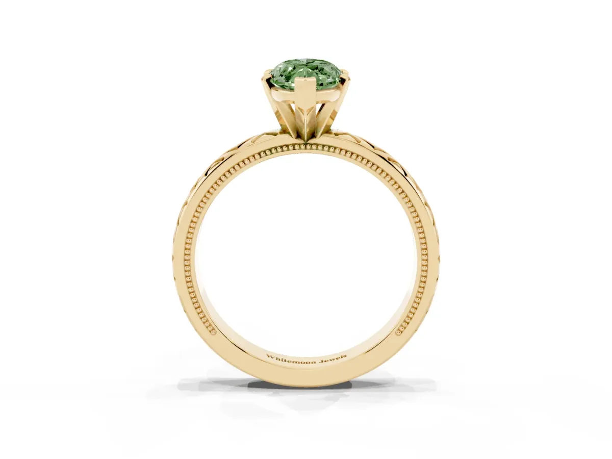 Fancy Green Marquise Cut Solitaire Diamond Ring with Milgrain and Black Enamel X Pattern Band Yellow gold