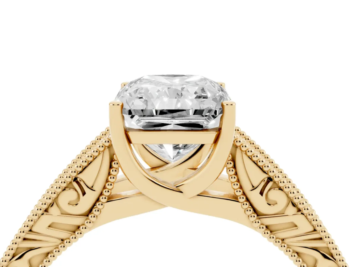 Radiant Cut Diamond Solitaire Ring with Engraved Band and Four-Prong Setting Yellow gold