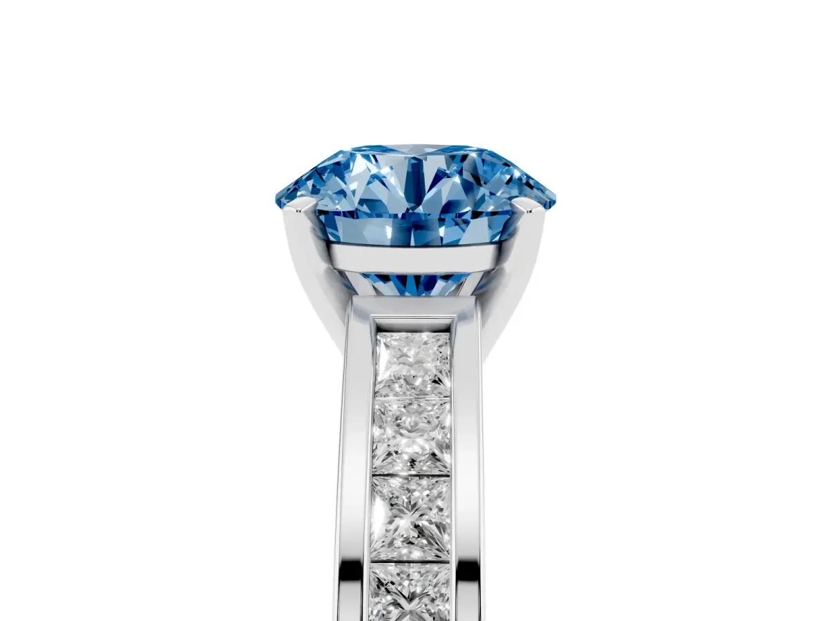 Fancy Blue Round Cut Solitaire Diamond Ring with Channel-Set Band and Four-Prong Setting Platinum