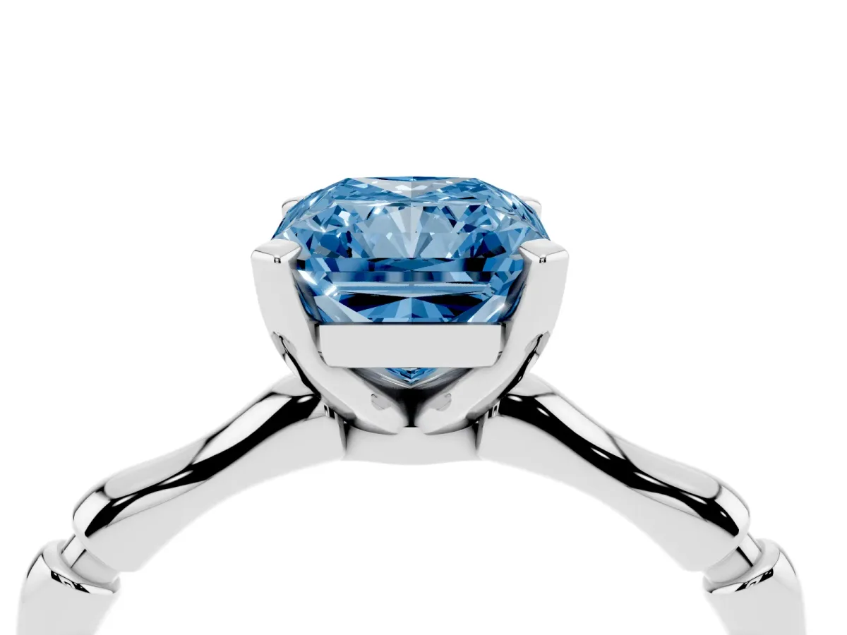 Fancy Blue Radiant Cut Solitaire Diamond Ring with Bamboo Band and Four-Prong Setting Silver