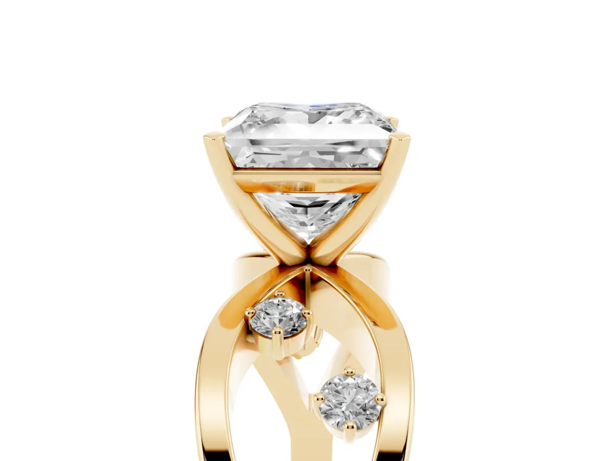 Princess Cut Cut Solitaire Diamond with Side Stones on Criss-Cross Band and Four-Prong Setting Yellow gold