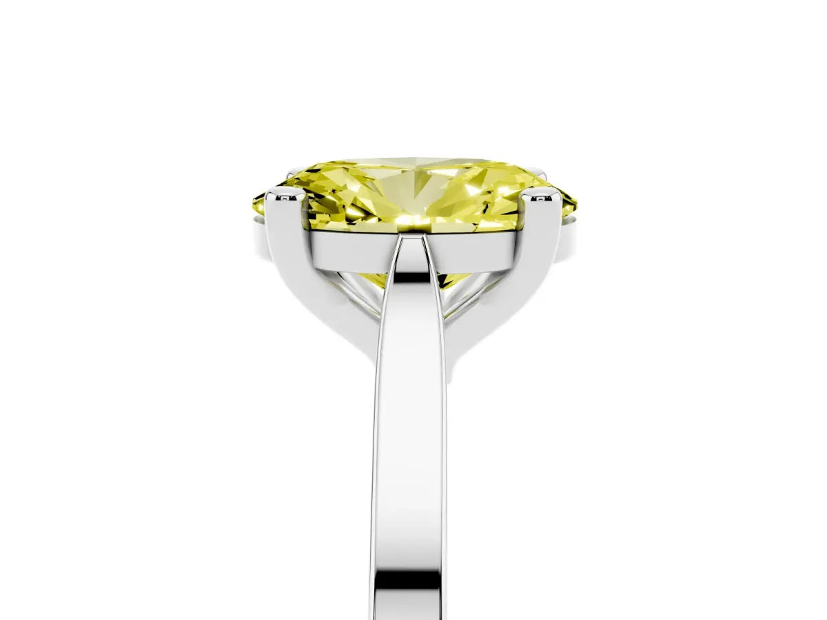 Fancy Yellow Oval Cut Solitaire Diamond Ring with Four-Prong Setting and Tapered Band Silver