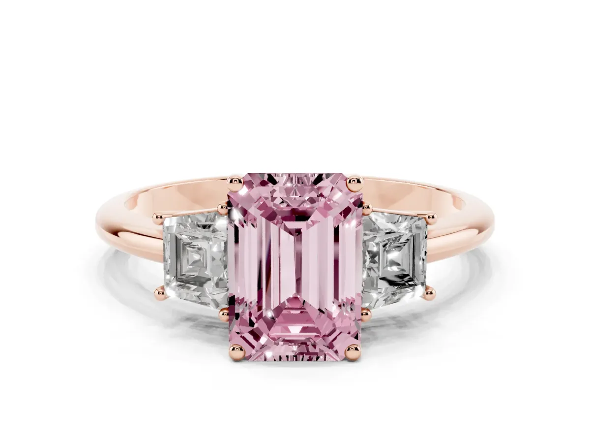Fancy Pink Emerald Cut Diamond Three-Stone Ring with Trapezoid Side Stones and Prong Setting Rose gold
