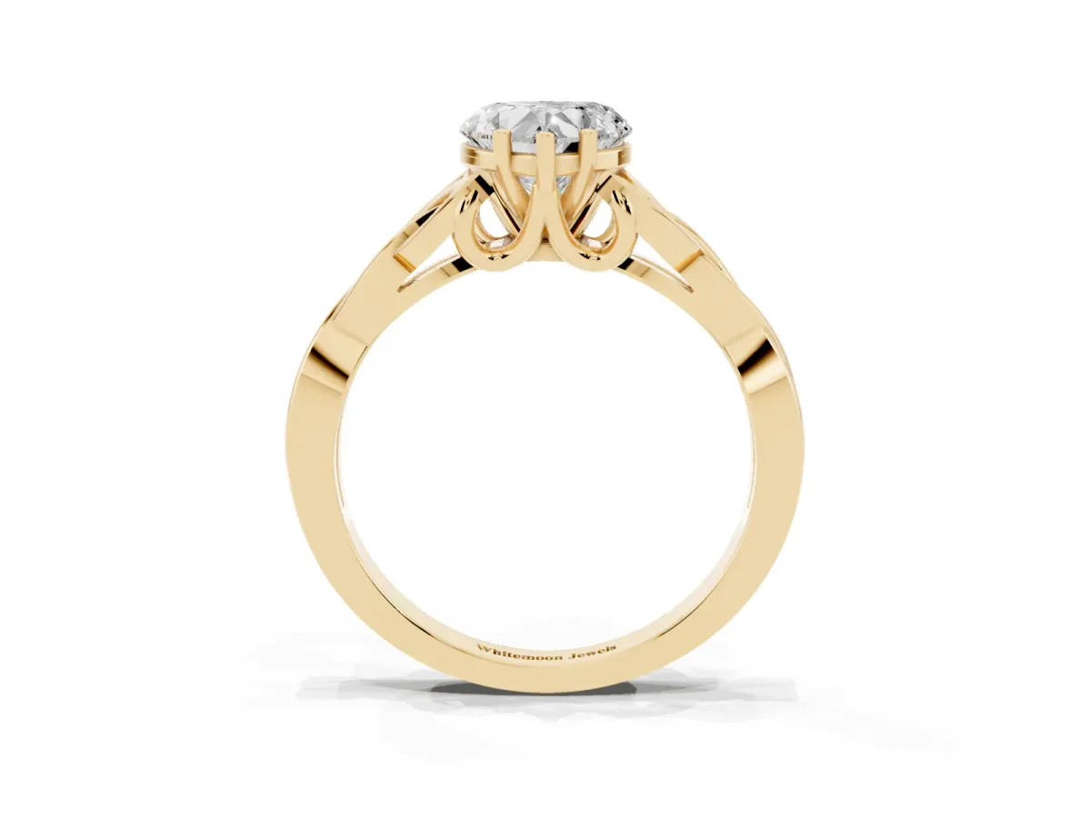Heart Cut Diamond Solitaire Engagement Ring with Celtic Knot Band and Four-Prong Setting Yellow gold