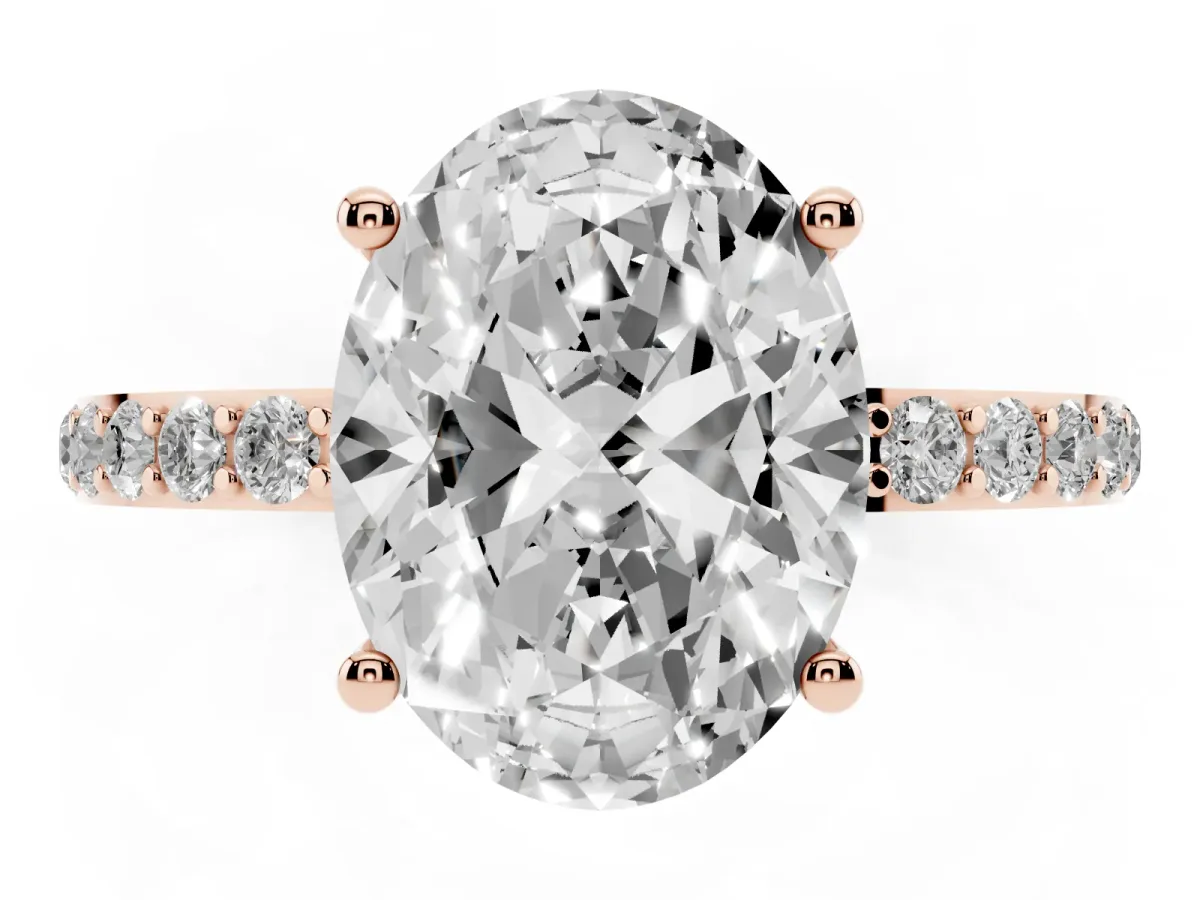 Oval Cut Diamond Solitaire Ring with Round Pavé Shoulders and Prong Setting Rose gold