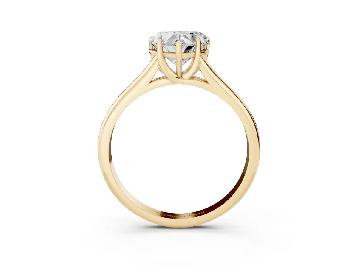 Heart Cut Cut Diamond Solitaire Engagement Ring with Tapered Plain Band and Four-Prong Setting Yellow gold