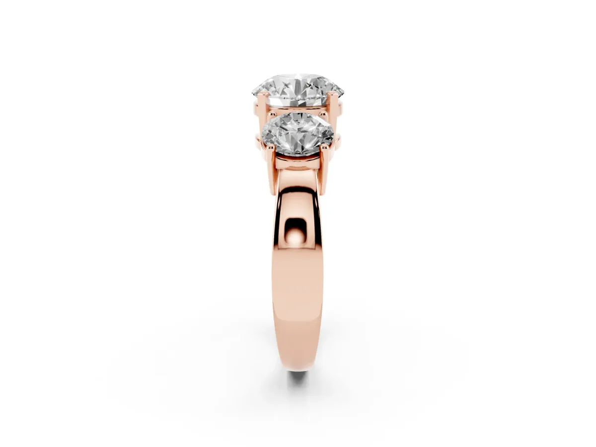 Three-Stone Round Cut Diamond Ring with Round Side Stones, Classic Band, and Four-Prong Setting Rose gold