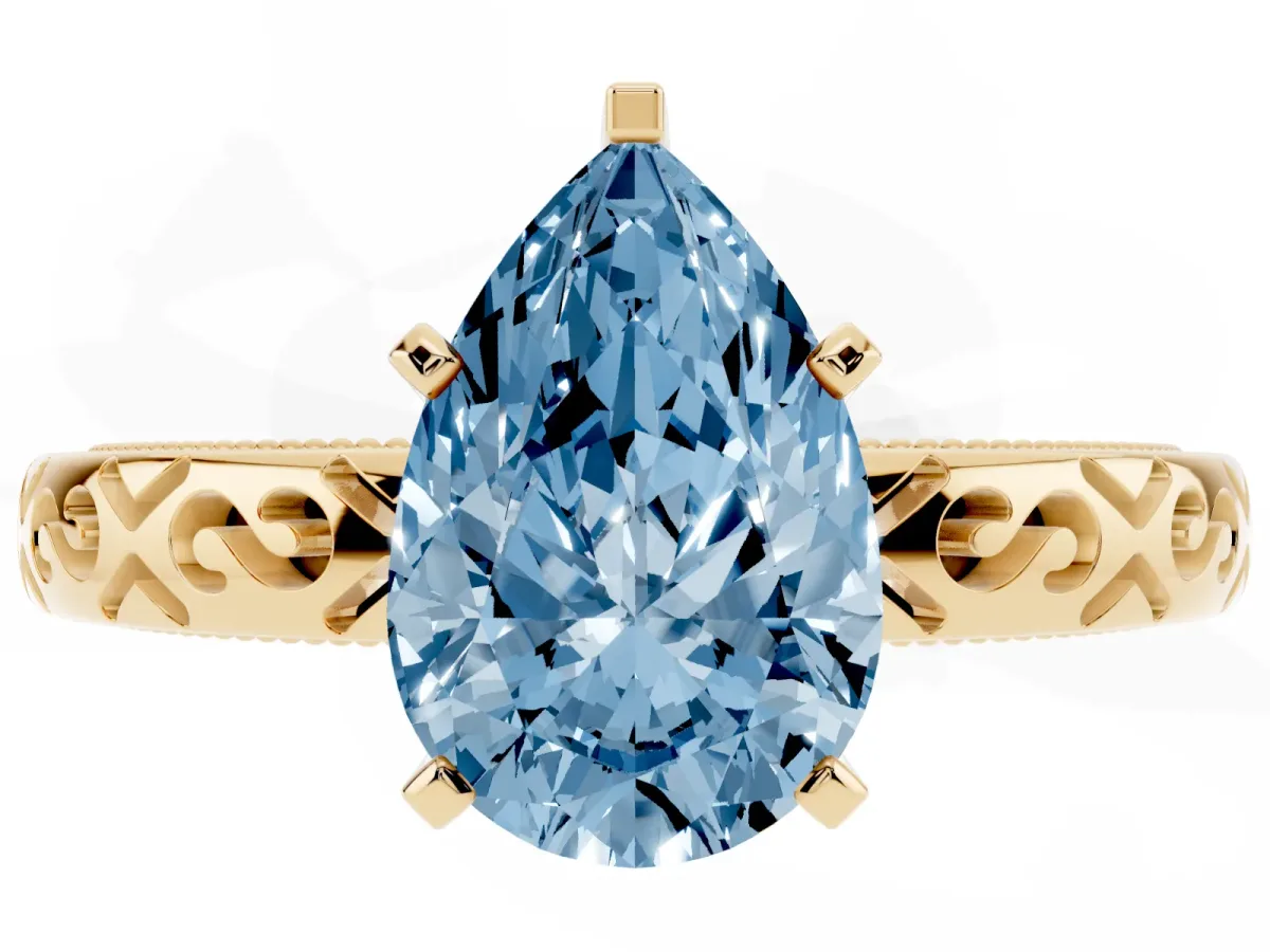 Fancy Blue Pear Cut Solitaire Engagement Ring with Scrollwork Band and Four-Prong Setting Yellow gold