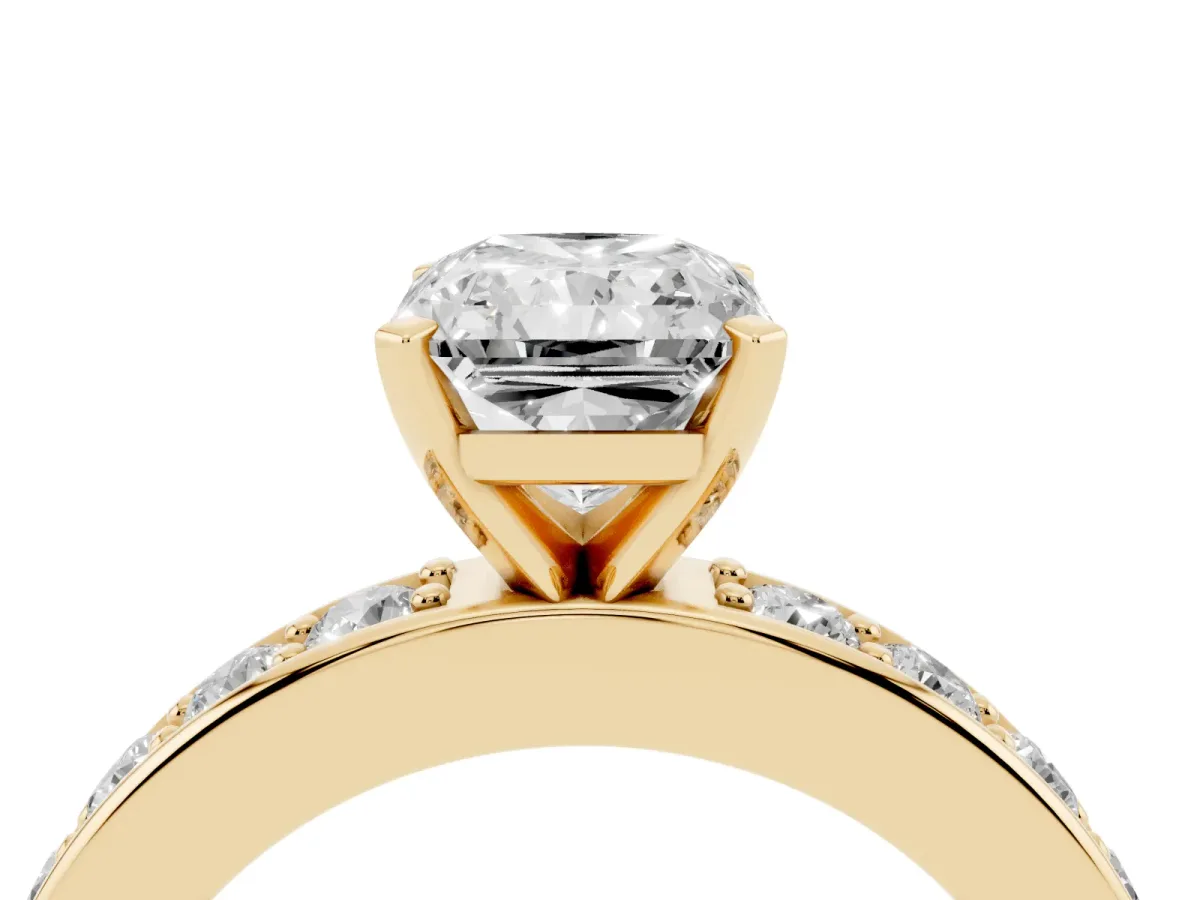 Radiant Cut Diamond Engagement Ring with Channel Set Round Band and Prong Setting Yellow gold