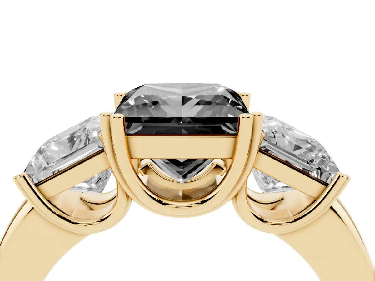 Fancy Black Three-Stone Princess Cut Cut Diamond Ring with Channel Set Band and Four-Prong Setting Yellow gold