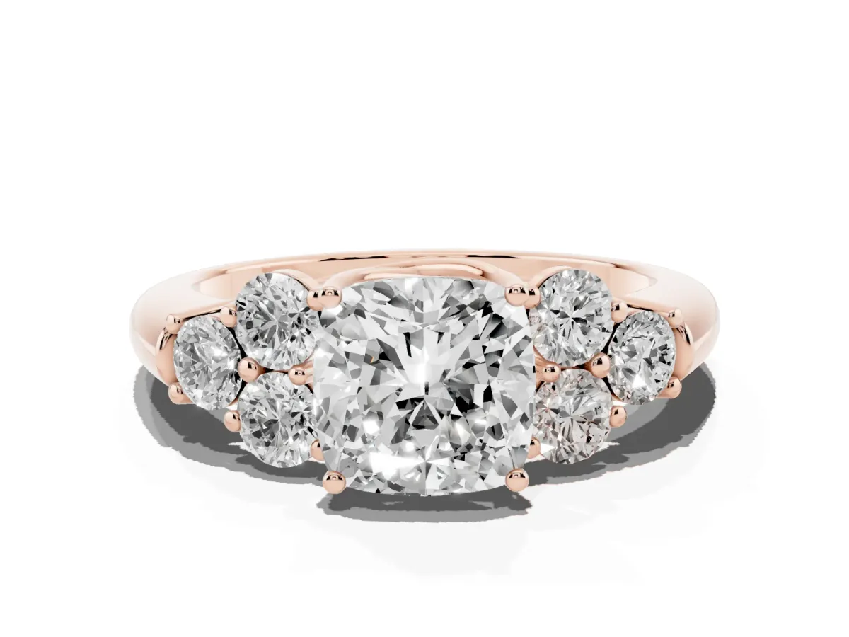 Cushion Cut Cut Diamond Cluster Ring with Round Accent Stones and Prong Setting on a Classic Band Rose gold