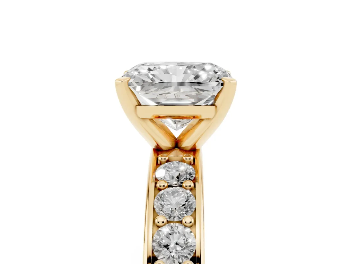 Radiant Cut Diamond Engagement Ring with Channel Set Round Band and Prong Setting Yellow gold