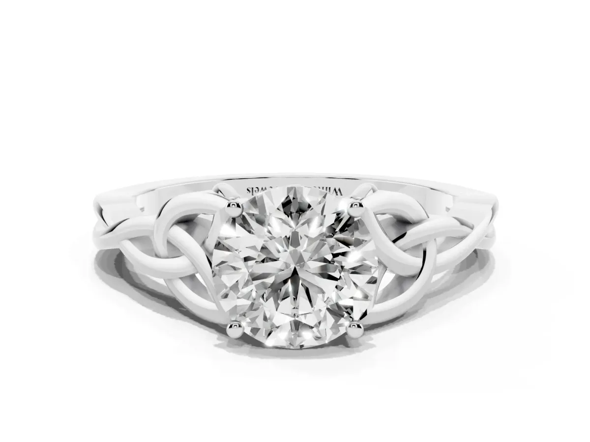 Round Cut Diamond Solitaire Engagement Ring with Celtic Knot Band and Four-Prong Setting Platinum