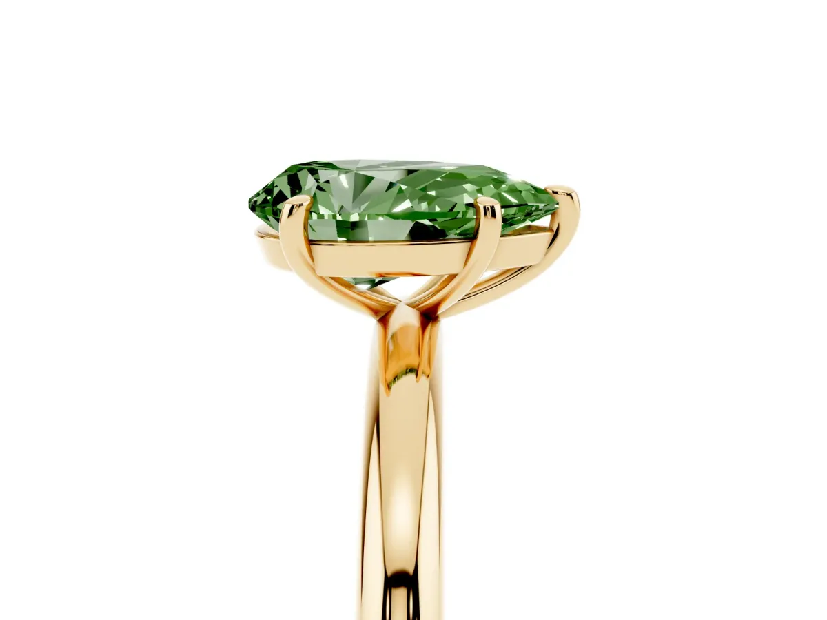 Fancy Green Pear Cut Solitaire Diamond Ring with Four-Prong Setting on a Plain Band Yellow gold