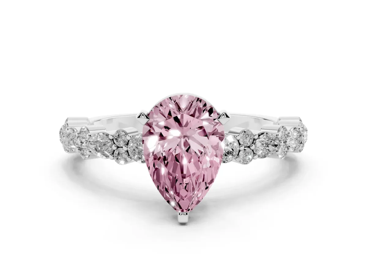 Fancy Pink Pear Cut Diamond Side Stone Solitaire Ring with Round and Four-Prong Setting Silver