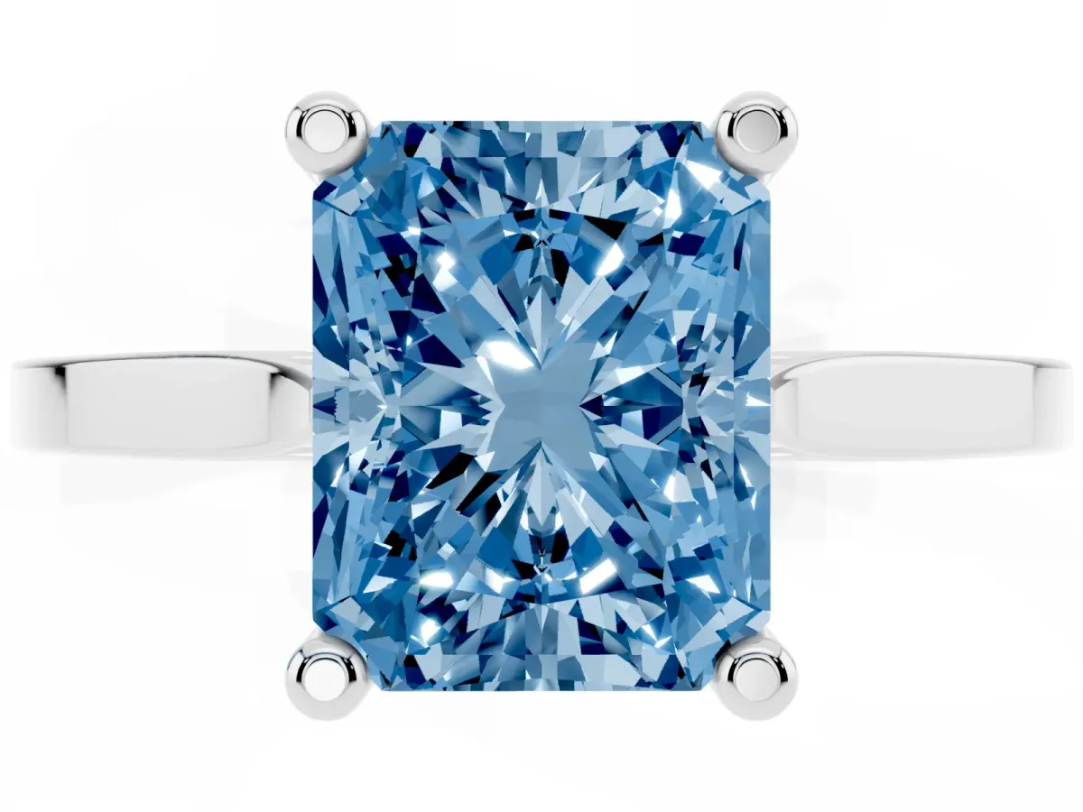 Fancy Blue Radiant Cut Solitaire Diamond Ring with Four-Prong Setting and Tapered Band Silver
