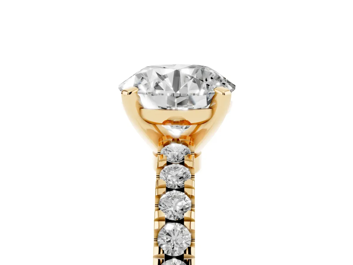 Round Cut Solitaire Diamond with Pavé Band and Four-Prong Setting Yellow gold