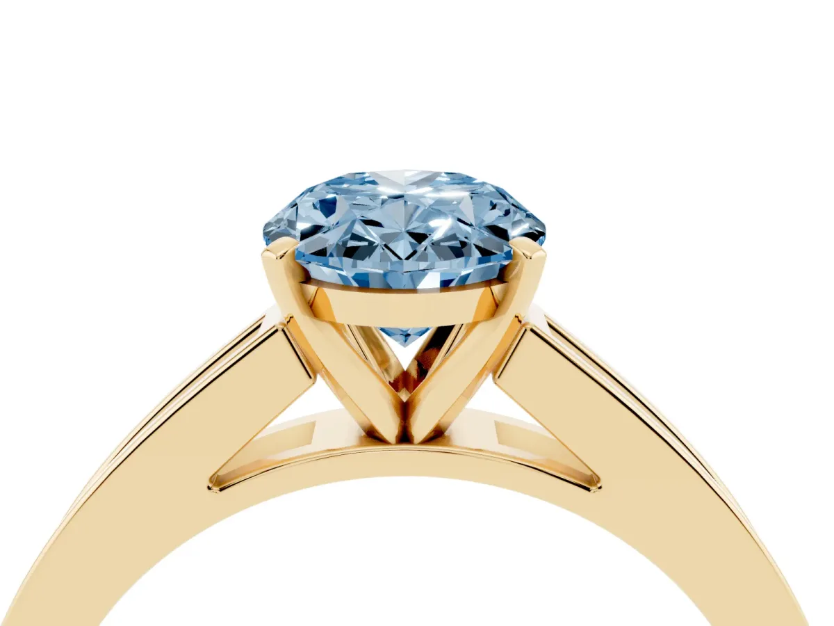 Fancy Blue Oval Cut Solitaire Diamond Ring with Channel-Set Band and Four-Prong Setting Yellow gold