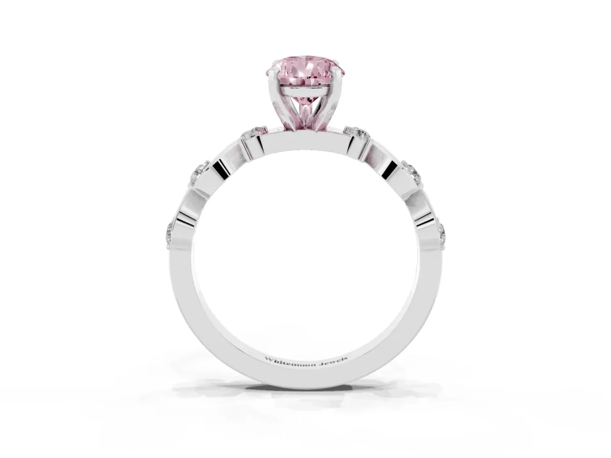 Fancy Pink Pear Cut Diamond Solitaire Twisted Band with Round Accents and Prong Setting Platinum