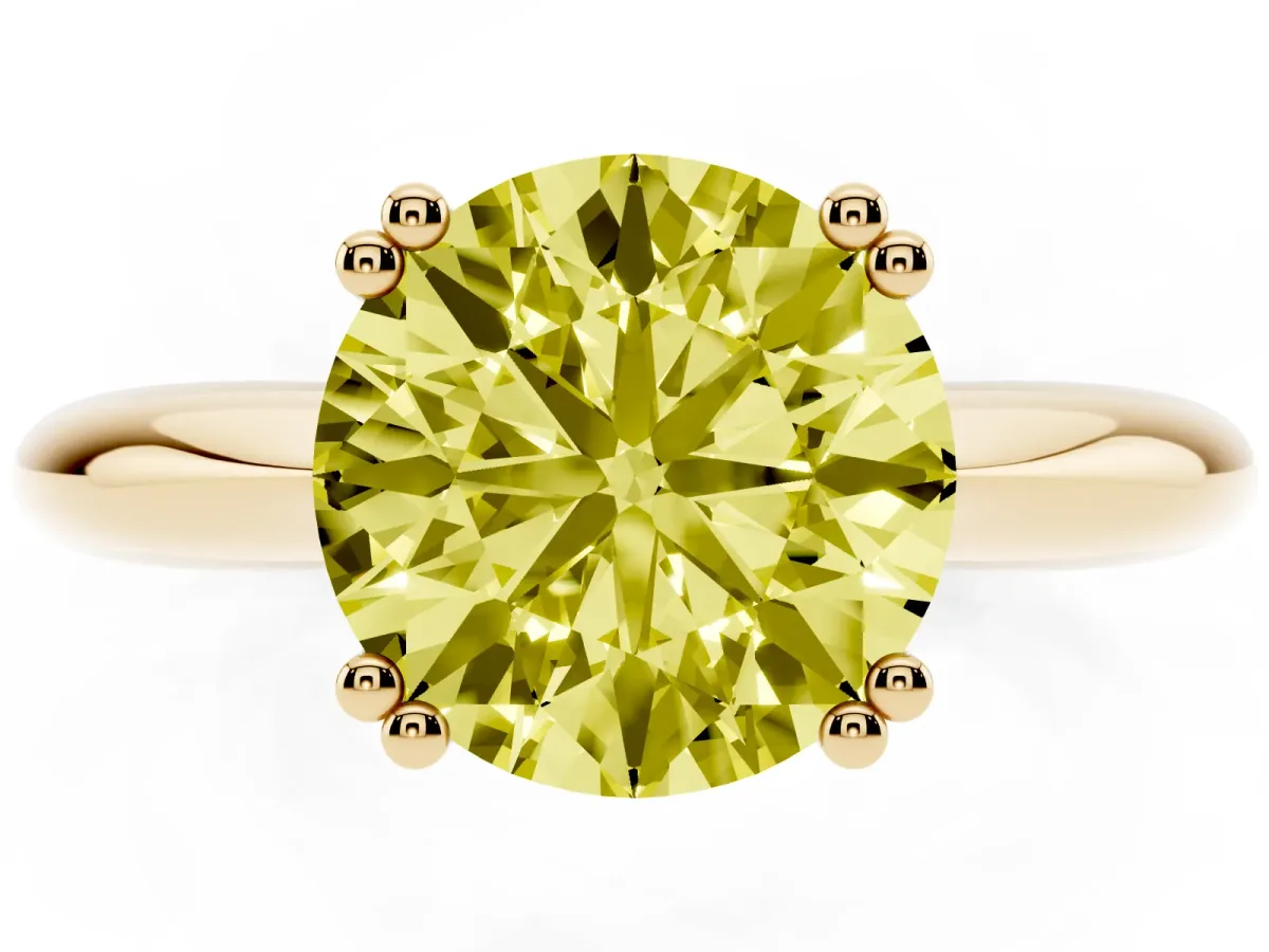 Fancy Yellow Round Cut Cut Solitaire Engagement Ring with Tapered Band and Four-Prong Setting Yellow gold