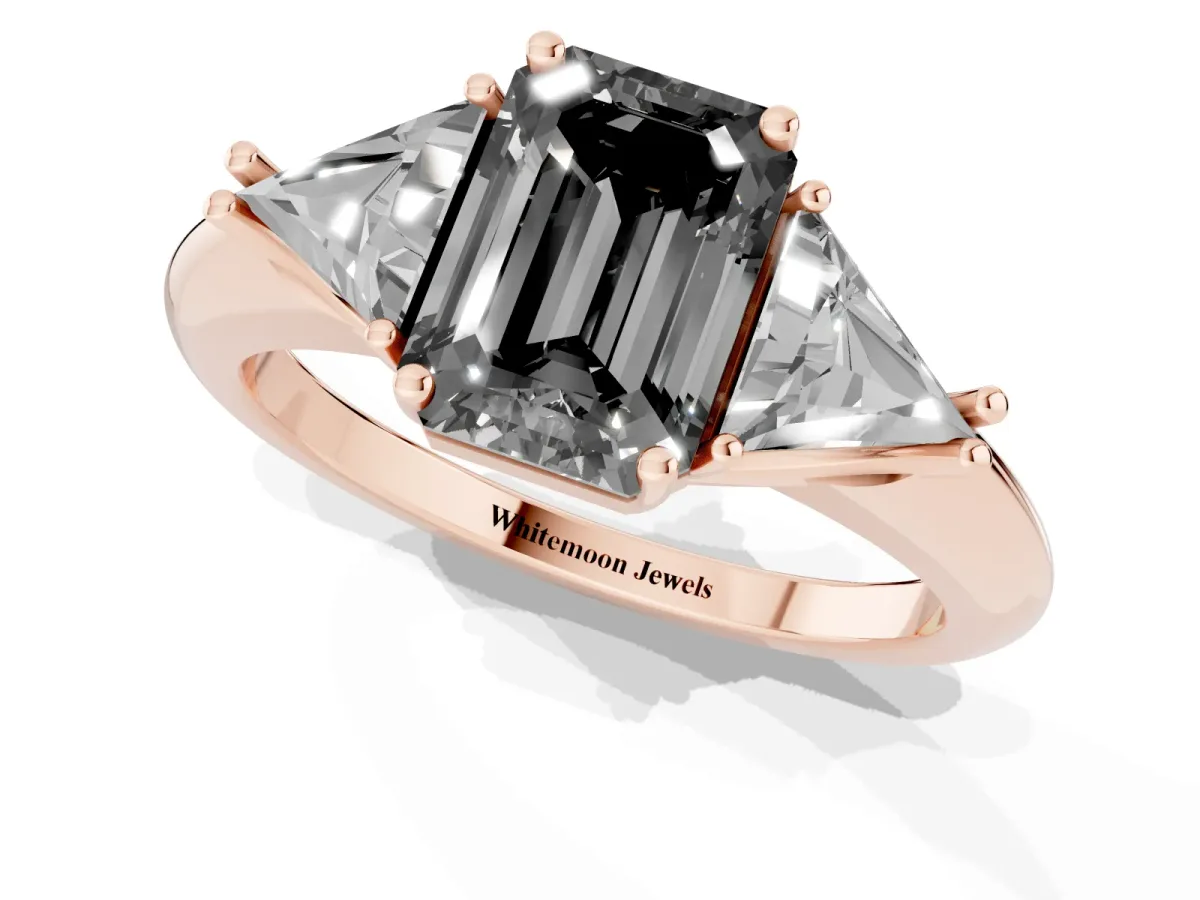 Fancy Black Three-Stone Emerald Cut Diamond Engagement Ring with Trillion Side Stones and Prong Setting Rose gold