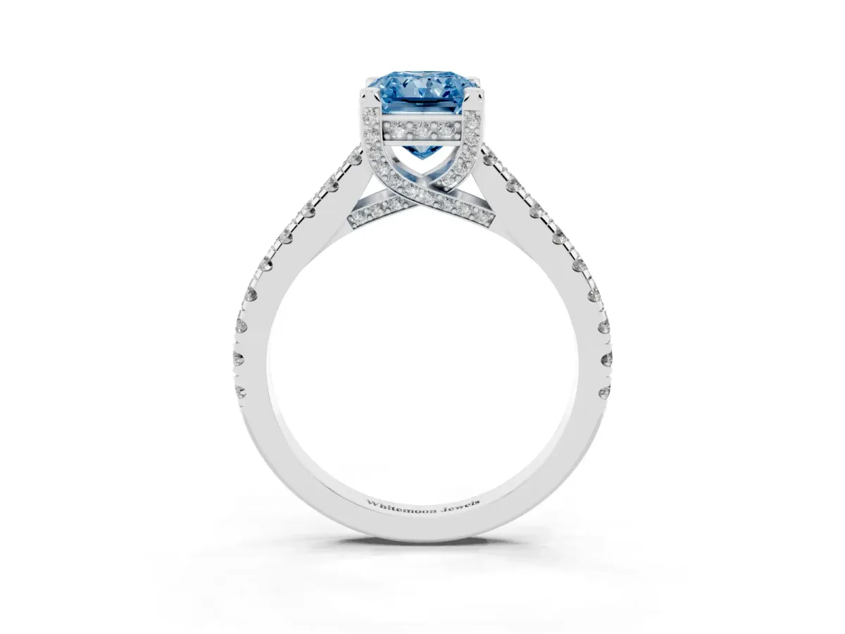 Fancy Blue Radiant Cut Brilliant Diamond Solitaire with Pavé Band and Four-Prong Setting Silver