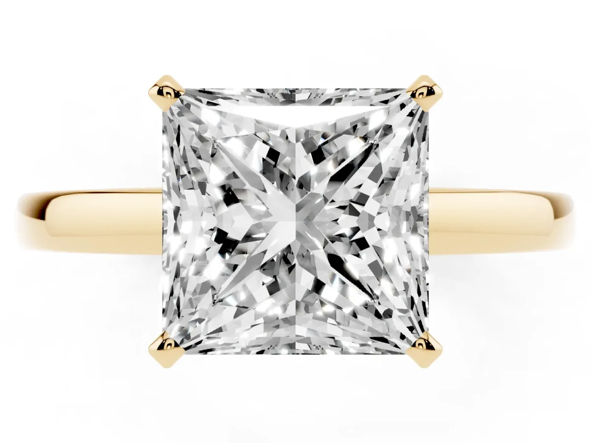 Princess Cut Solitaire Diamond Engagement Ring with Four-Prong Setting on a Classic Band Yellow gold