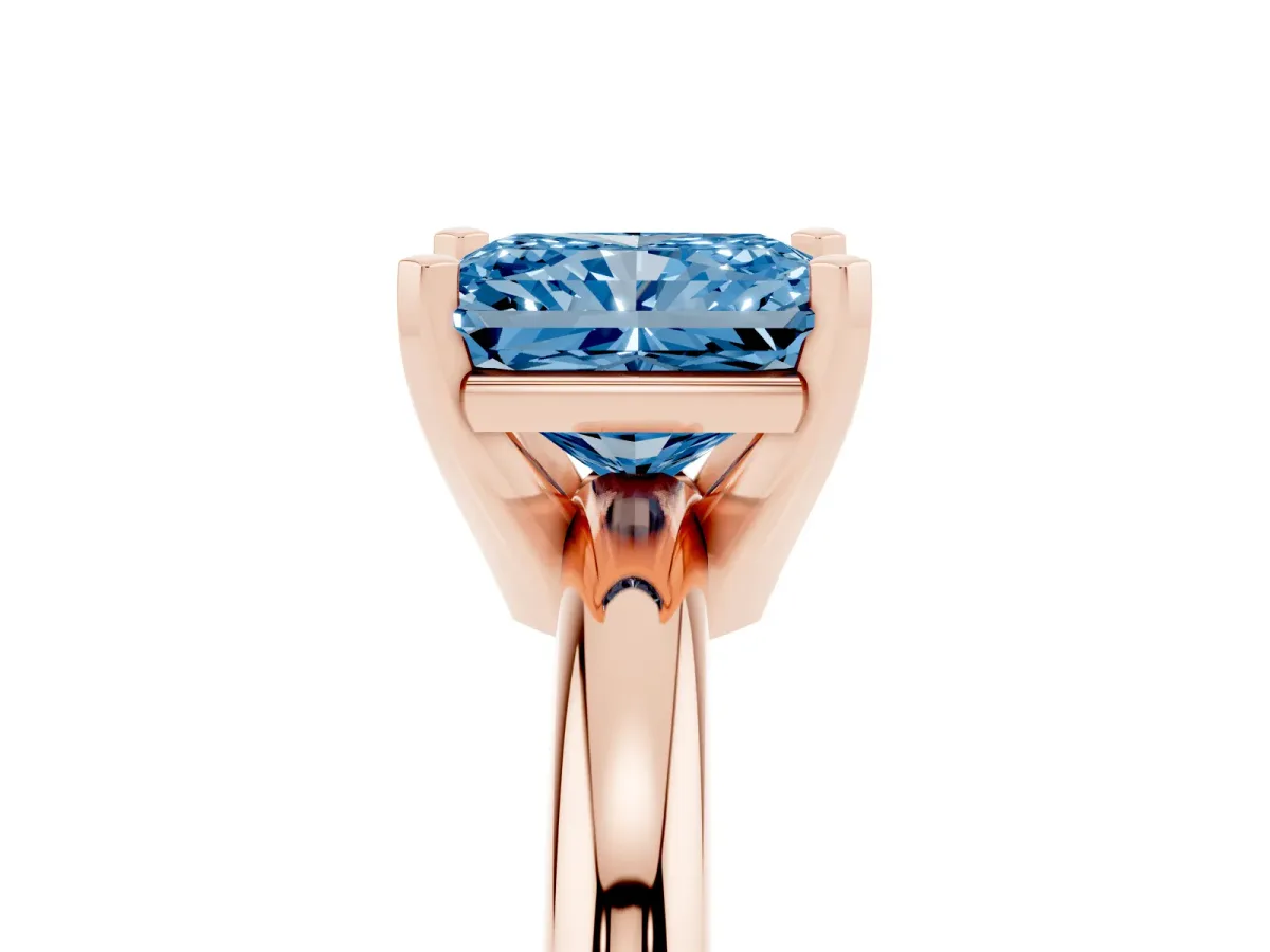Fancy Blue Radiant Cut Diamond Solitaire Engagement Ring with Round Band and Four-Prong Setting Rose gold
