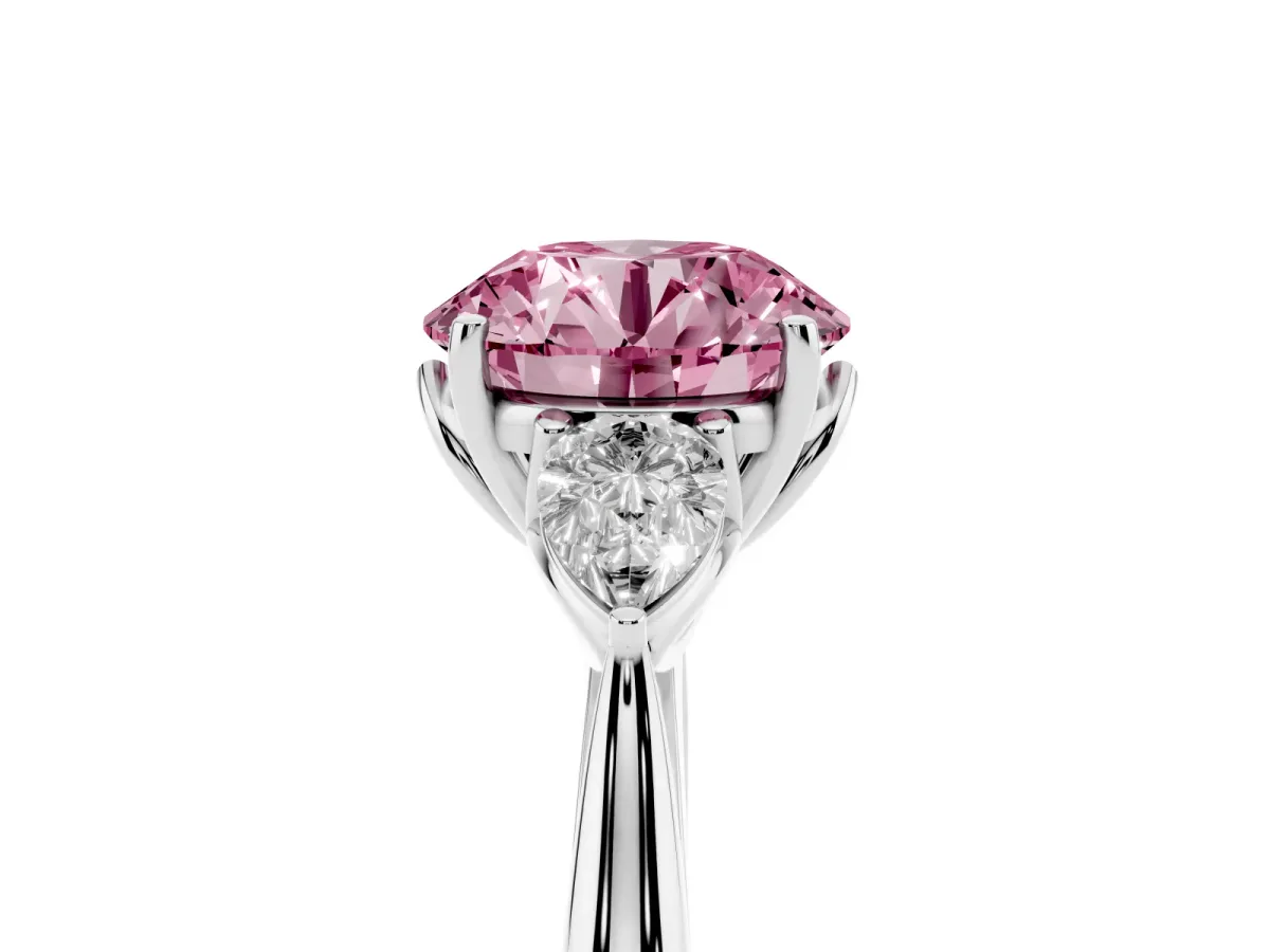 Fancy Pink Round Cut Diamond Three-Stone Ring with Pear Side Stones and Prong Setting Silver