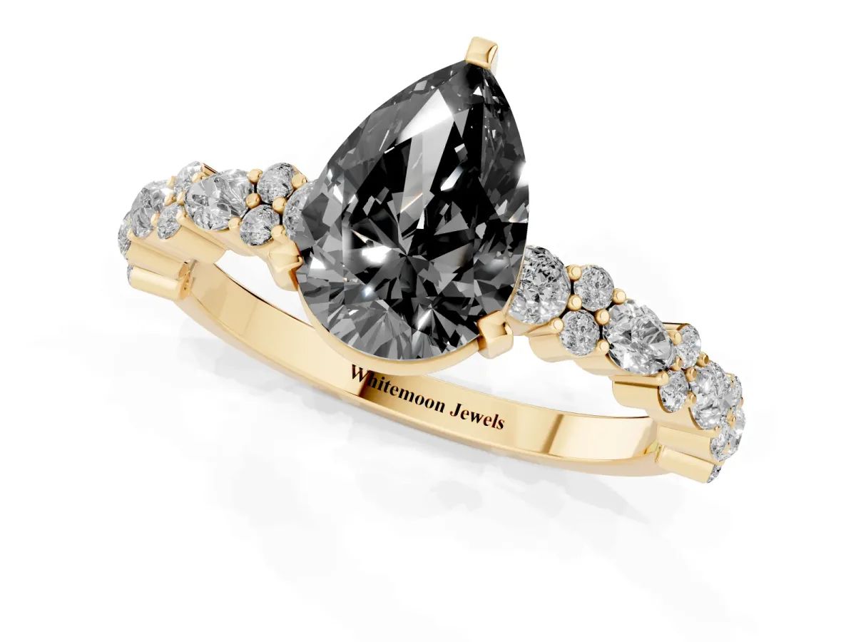 Fancy Black Pear Cut Diamond Side Stone Solitaire Ring with Round and Four-Prong Setting Yellow gold