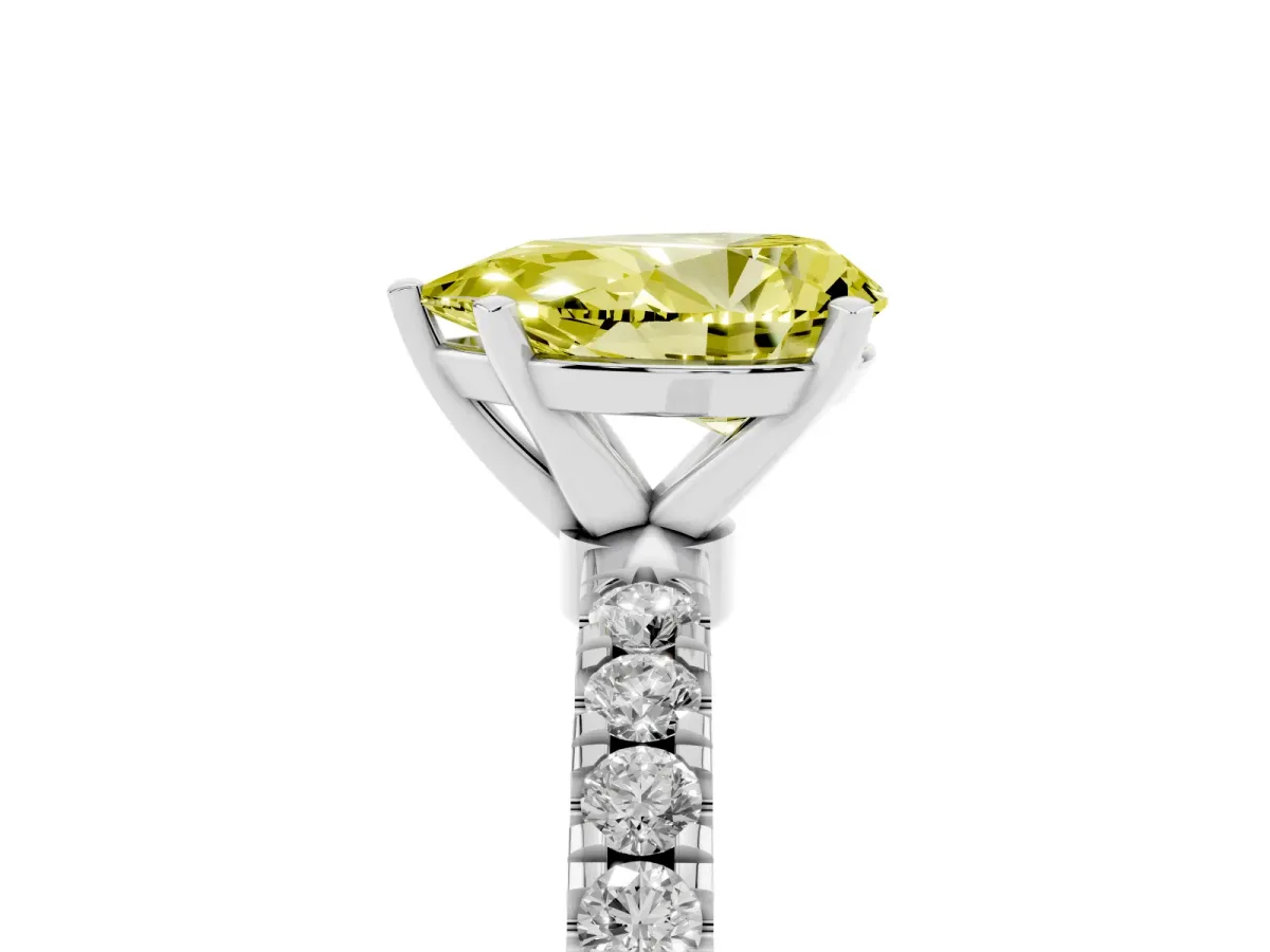 Fancy Yellow Pear Cut Diamond Solitaire Ring with Pavé Accents and Four-Prong Setting Silver