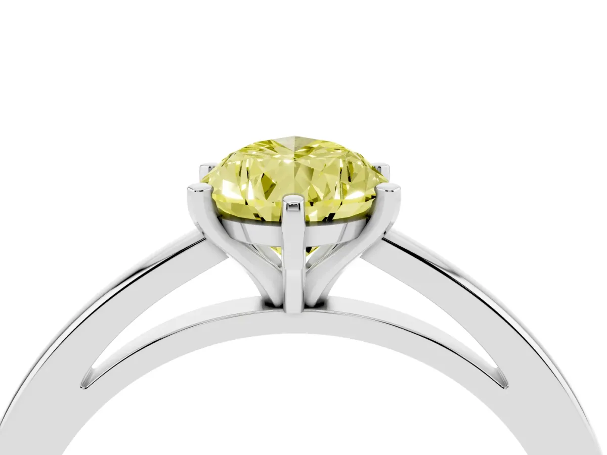 Fancy Yellow Pear Cut Solitaire Diamond Engagement Ring with Four-Prong Setting on a Classic Band White gold